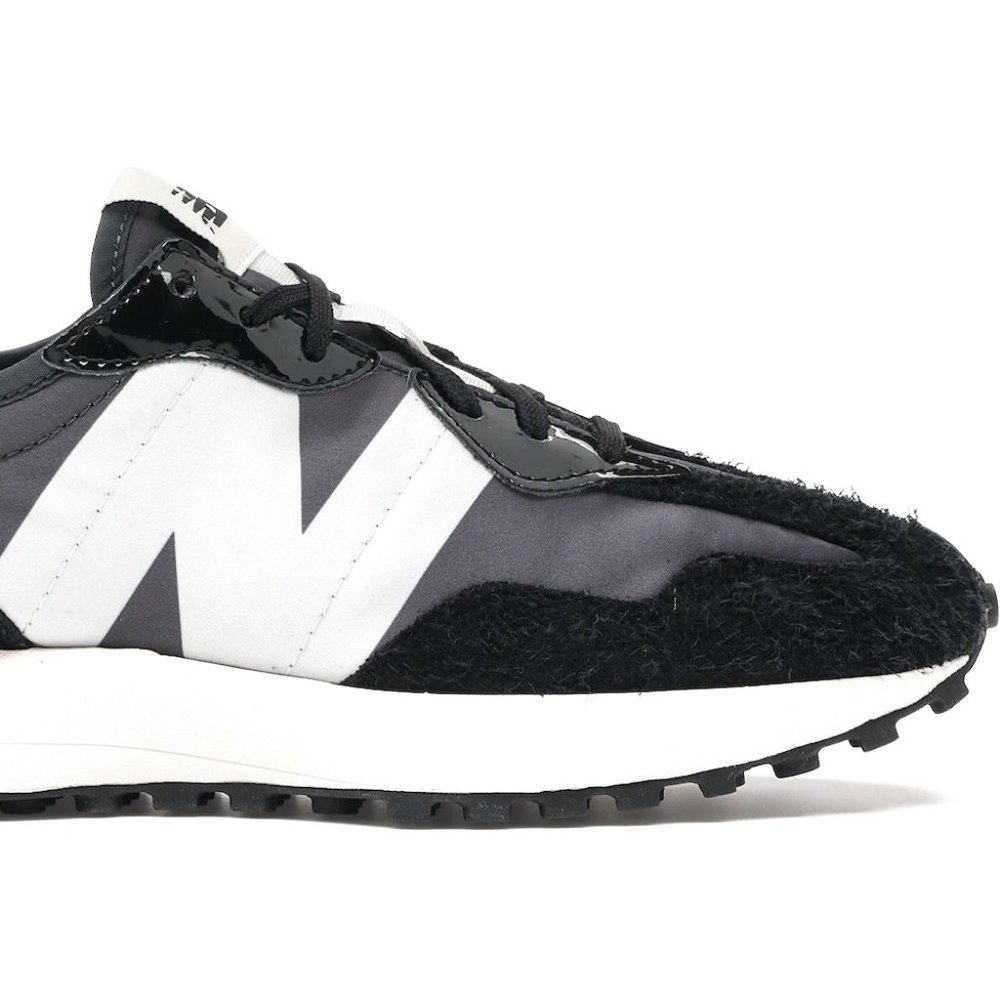 New Balance 327 sneakers in black and gray